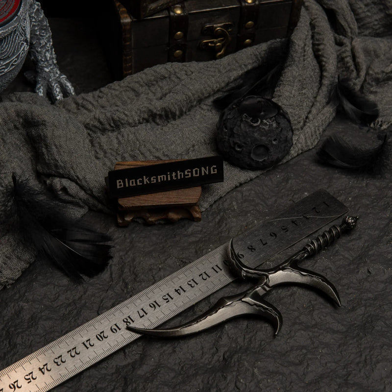 Black Knife replica placed next to a ruler showing a length of approximately 18cm.
