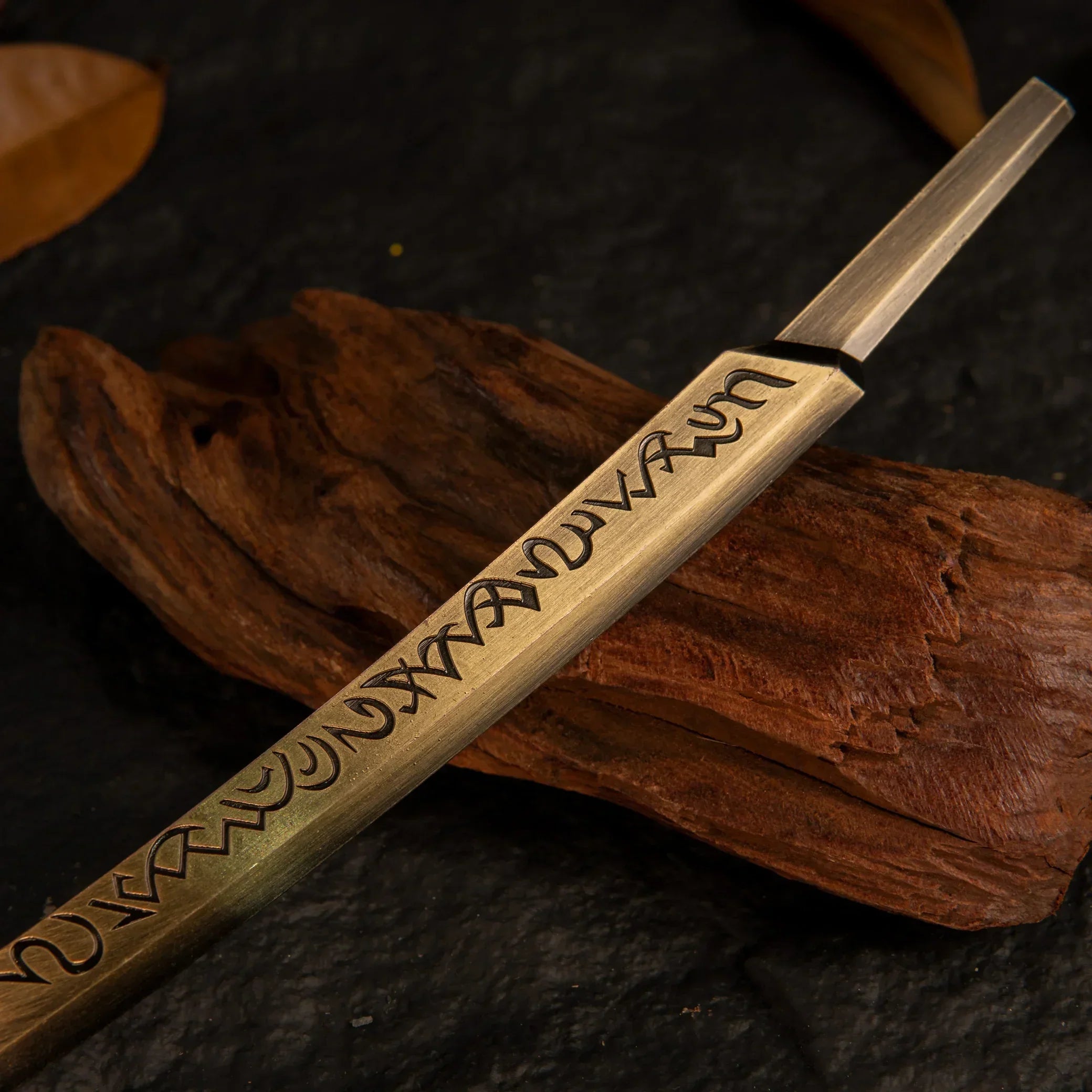 Close-up detail of the Hand of Malenia's handle, designed to look like a prosthetic attachment.