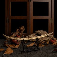 Hand of Malenia displayed on a small horizontal stand, showing the full curve of the blade.