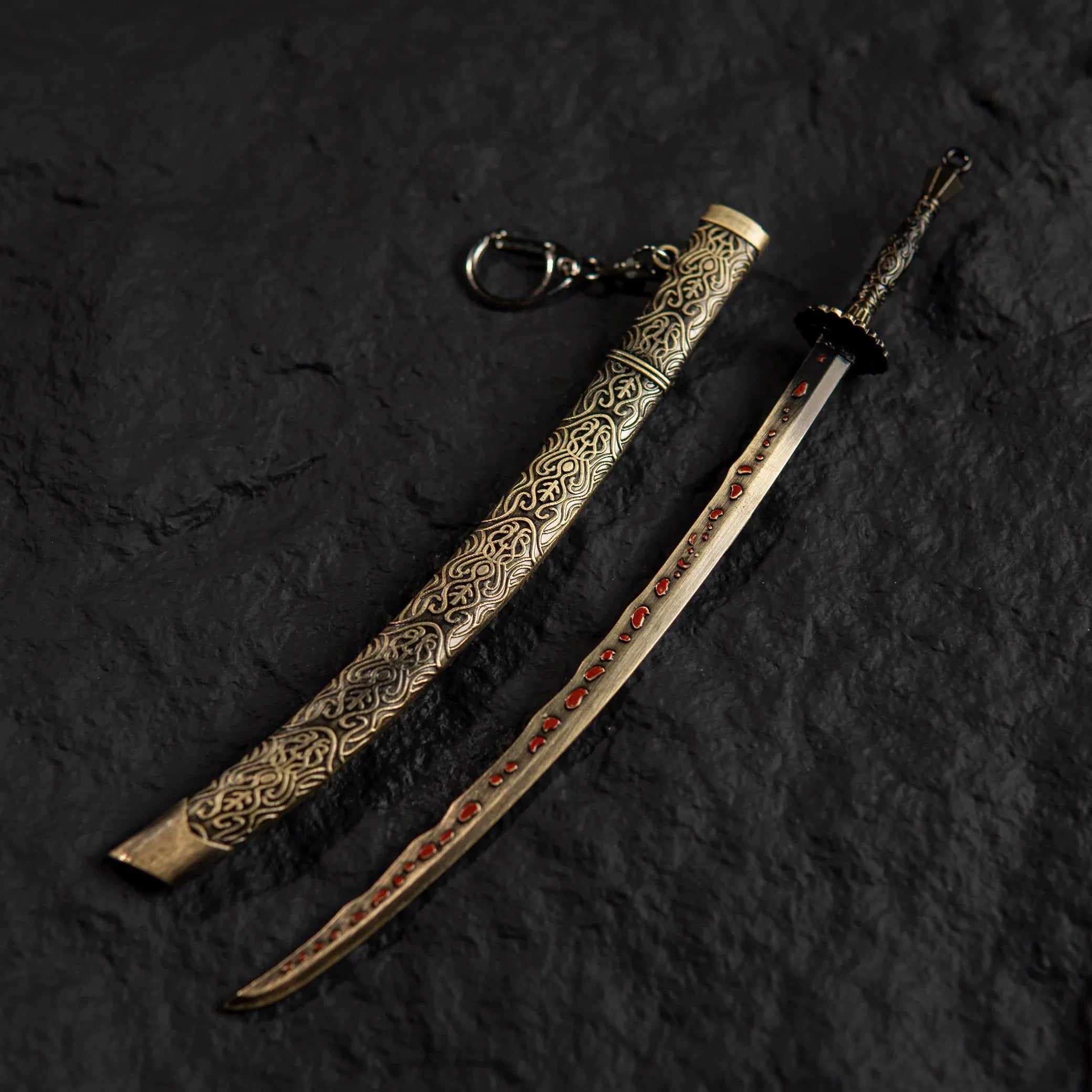 Meteoric Ore Blade metal replica from Elden Ring isolated on a black background.