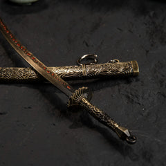 Close-up detail of the Meteoric Ore Blade hilt and ornate bronze scabbard engravings.