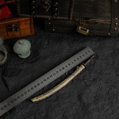 Meteoric Ore Blade replica placed next to a ruler showing a length of approximately 22cm.