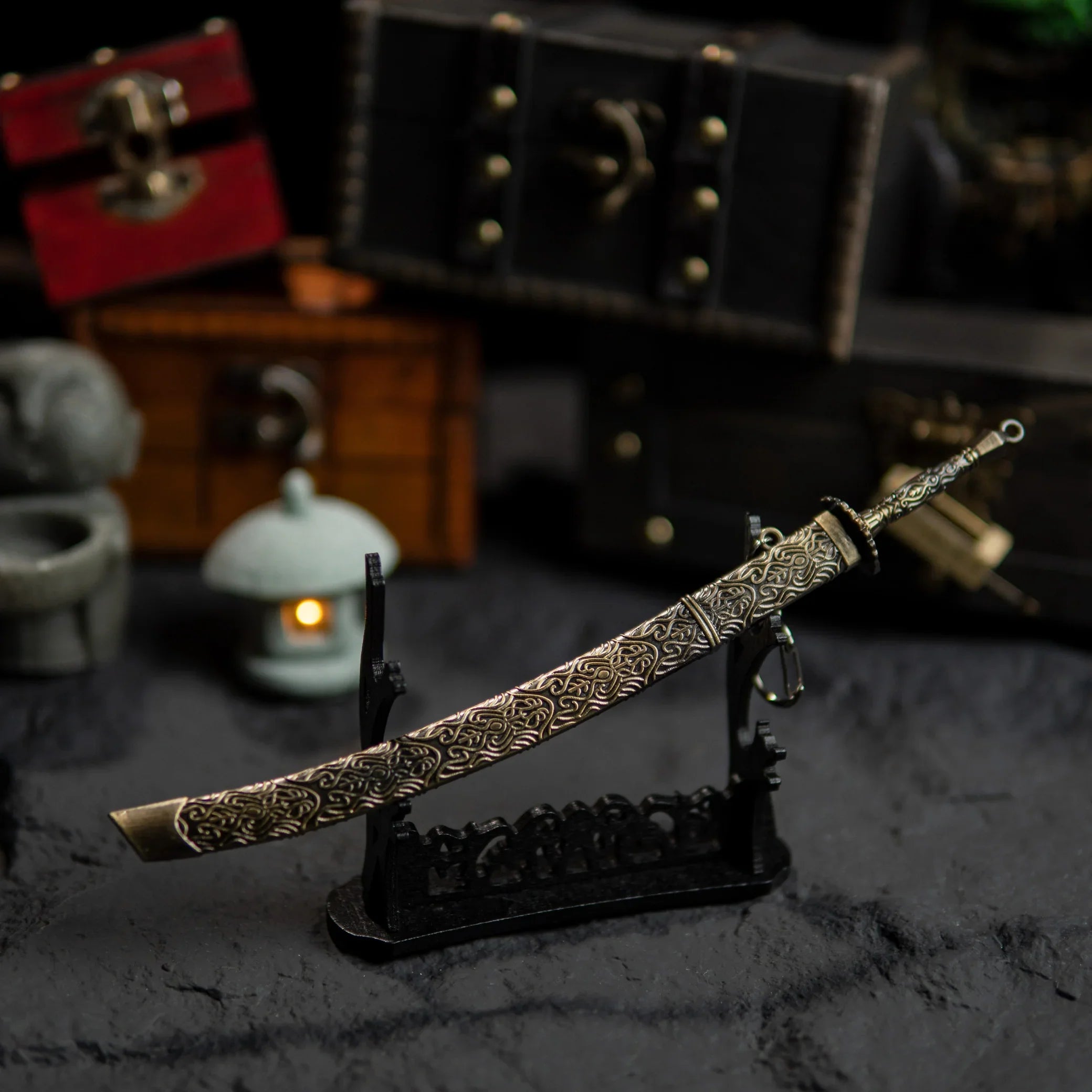 Meteoric Ore Blade displayed horizontally on a large black stand with chests in the background.