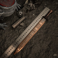 Regalia of Eochaid replica placed next to a ruler showing a length of approximately 30cm.