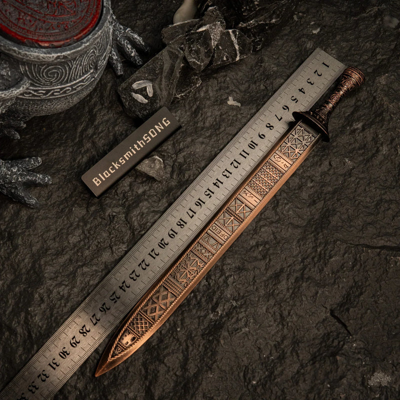 Regalia of Eochaid replica placed next to a ruler showing a length of approximately 30cm.
