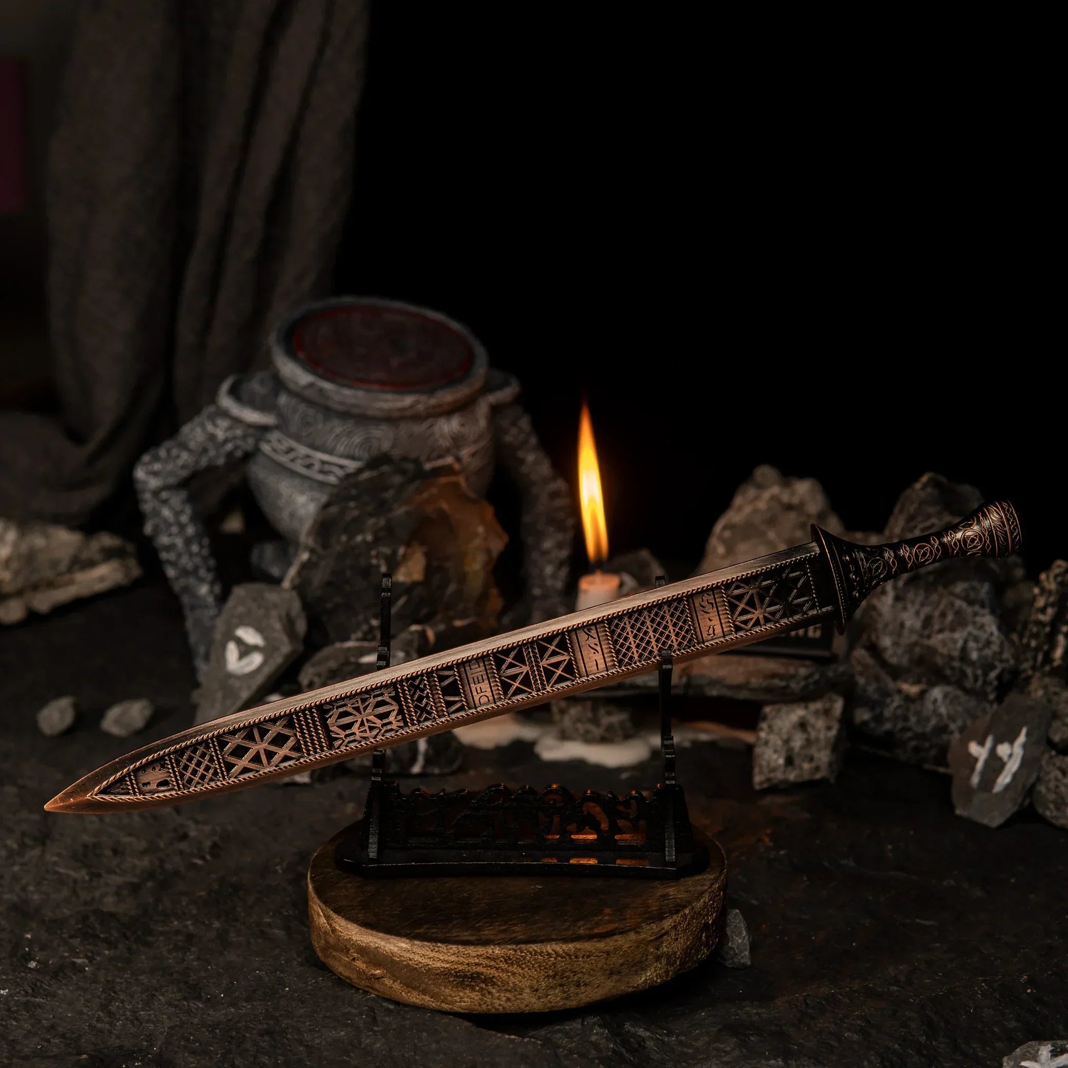 Regalia of Eochaid displayed horizontally on a large black sword stand.