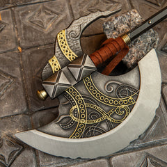 Axe of Godfrey replica — gold scrollwork, studded collar and wrapped grip in close-up.