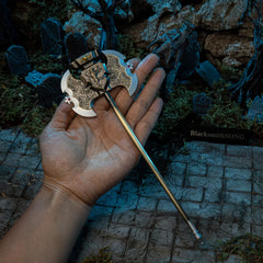 Axe of Godrick replica (23cm die-cast zinc alloy greataxe) — held in hand for scale.
