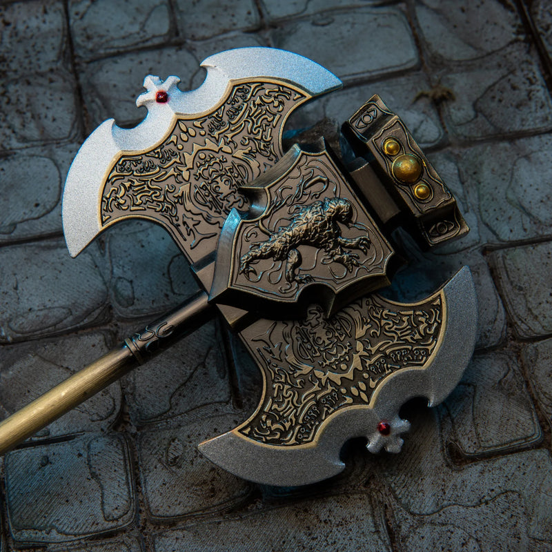 Axe of Godrick replica — twin crescent blades and knotwork engraving, overhead close-up.