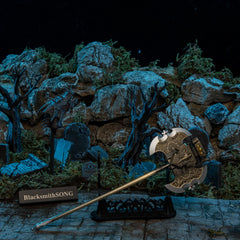 Axe of Godrick replica — laid full length across the large display stand.