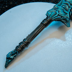 Crystal Knife replica — close-up of the wrapped grip and pointed pommel spike.
