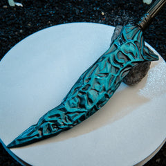 Crystal Knife replica — Elden Ring dagger, faceted blade and wrapped grip on a plain backdrop.