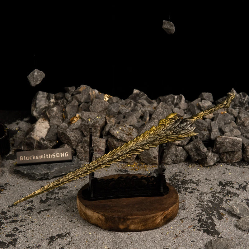 Dragon King's Cragblade displayed horizontally on a large black sword stand with a wooden base, surrounded by rocks.