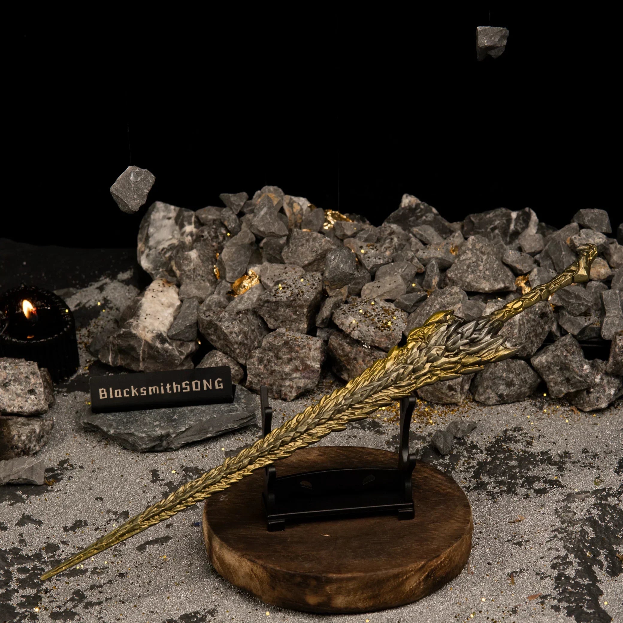 Dragon King's Cragblade displayed on a small horizontal stand in a dark, rocky setting.