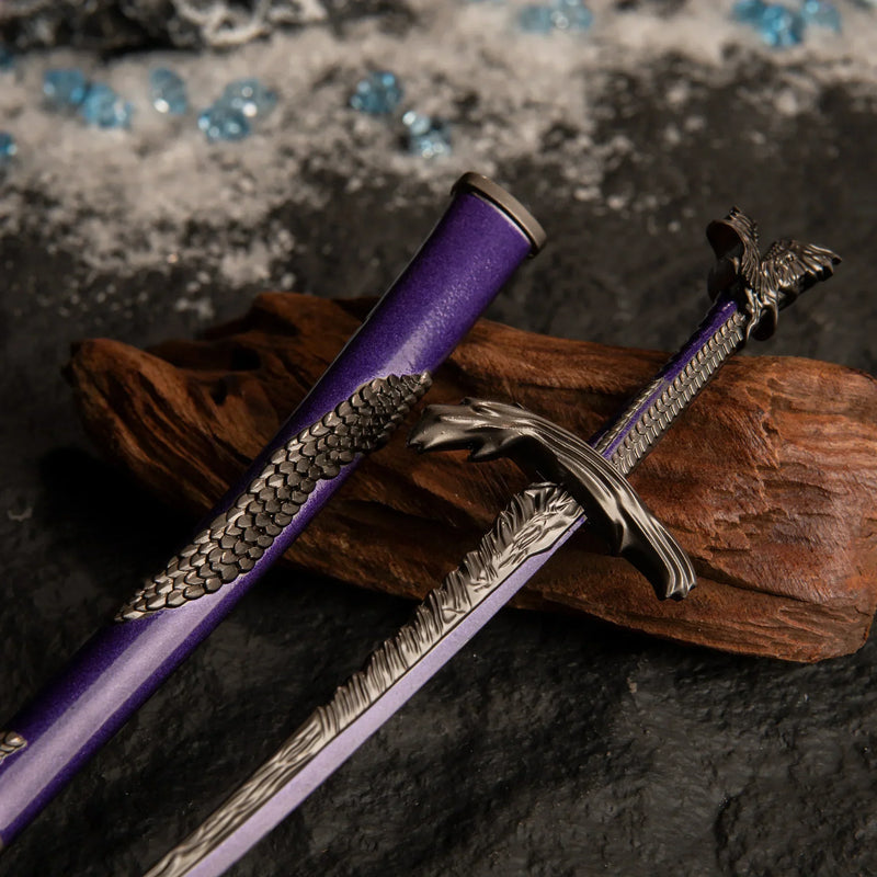 Close-up detail of the raised silver dragon scales on the purple scabbard of the Dragonscale Blade replica.