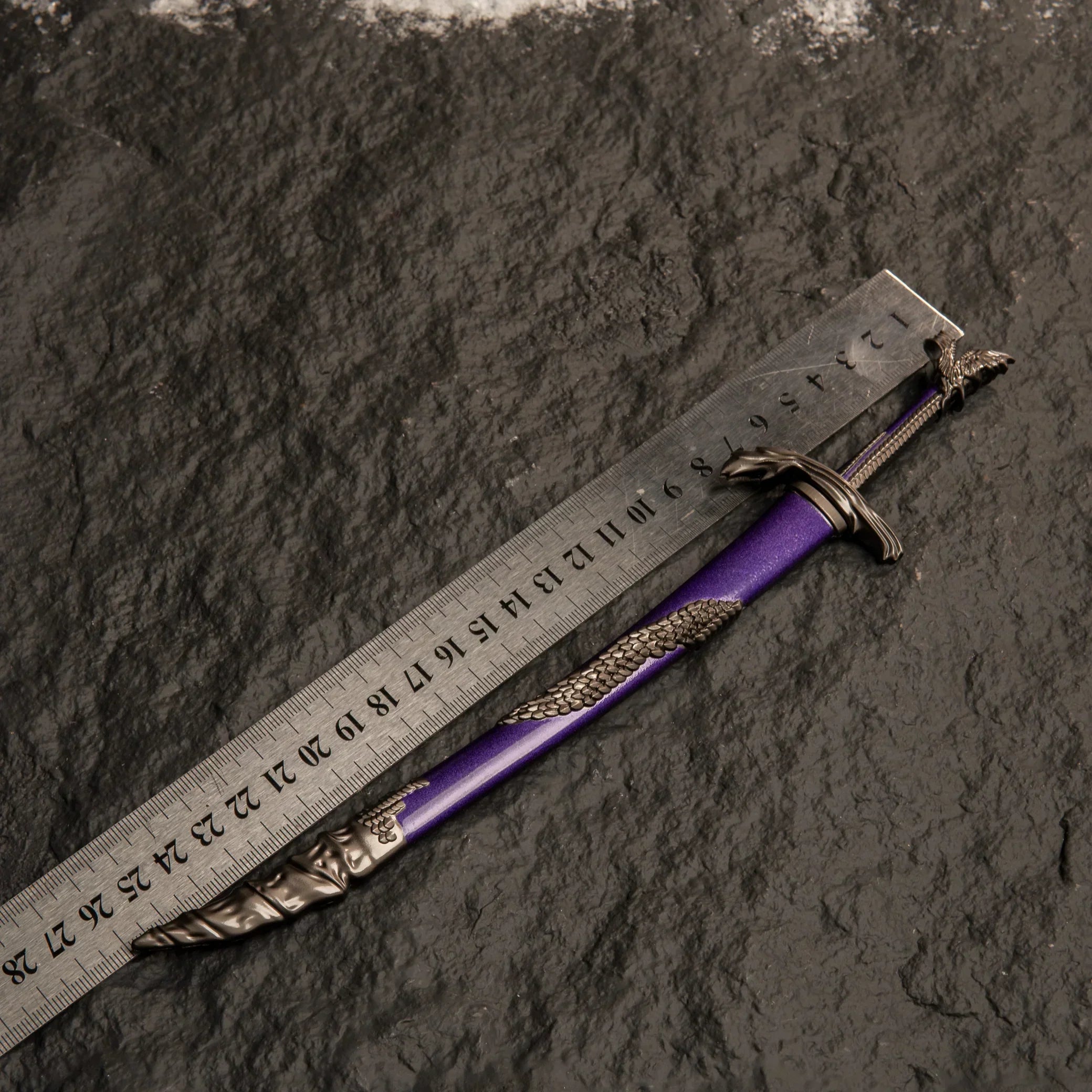 Dragonscale Blade replica placed next to a ruler showing a length of approximately 26cm.
