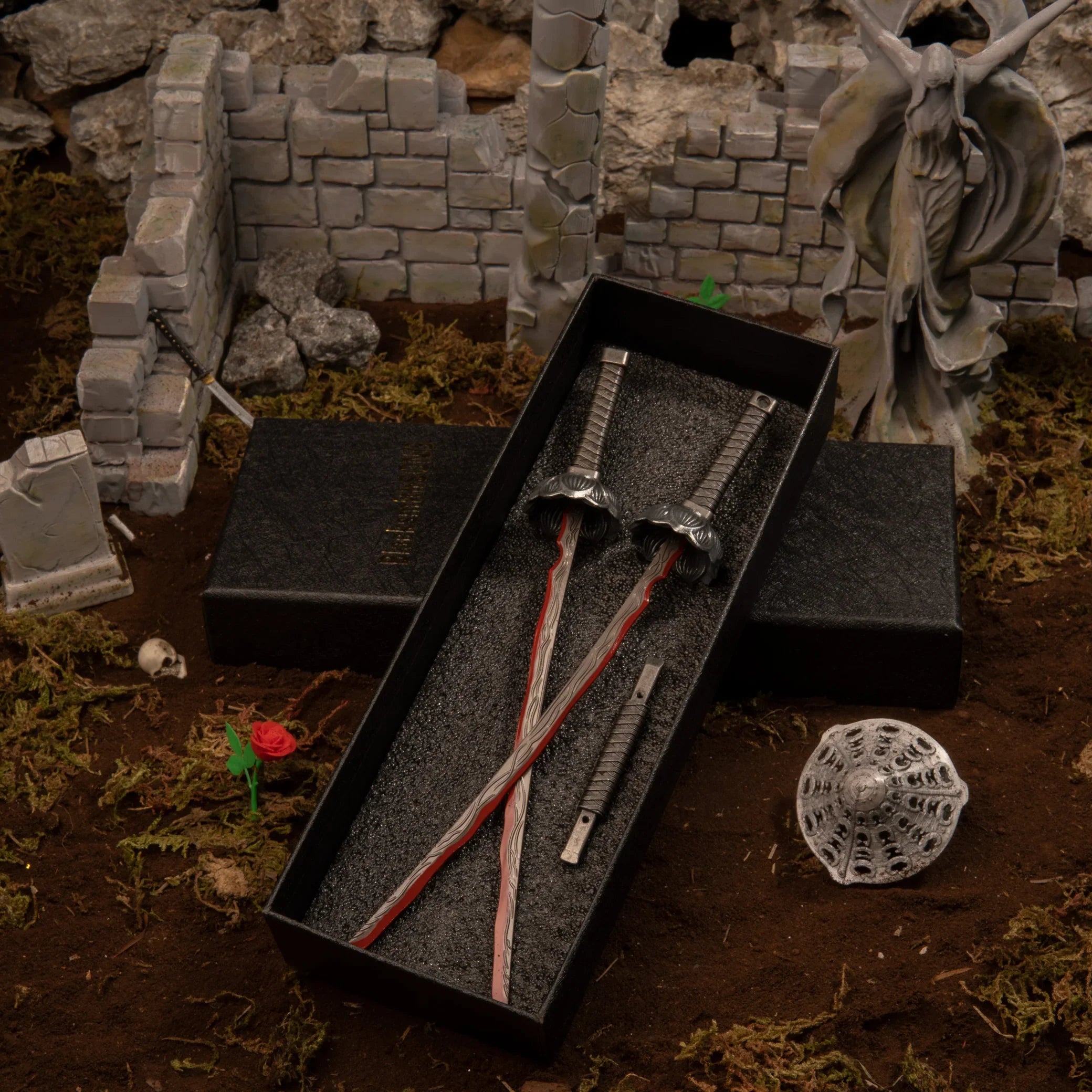1/6 scale Eleonora's Poleblade metal miniature separated inside a black gift box, placed in the ruins of the Second Church of Marika diorama.