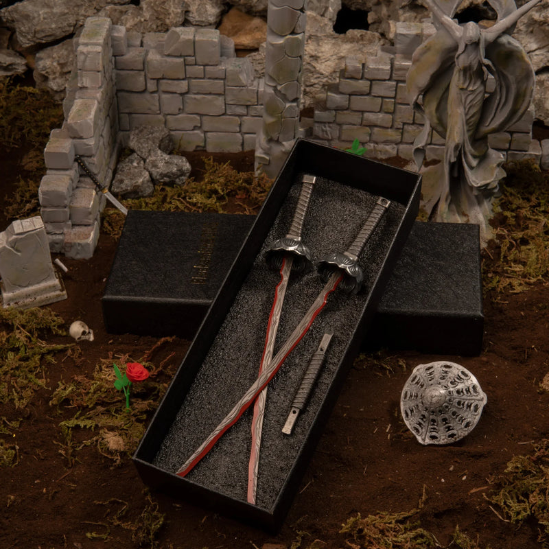 1/6 scale Eleonora's Poleblade metal miniature separated inside a black gift box, placed in the ruins of the Second Church of Marika diorama.