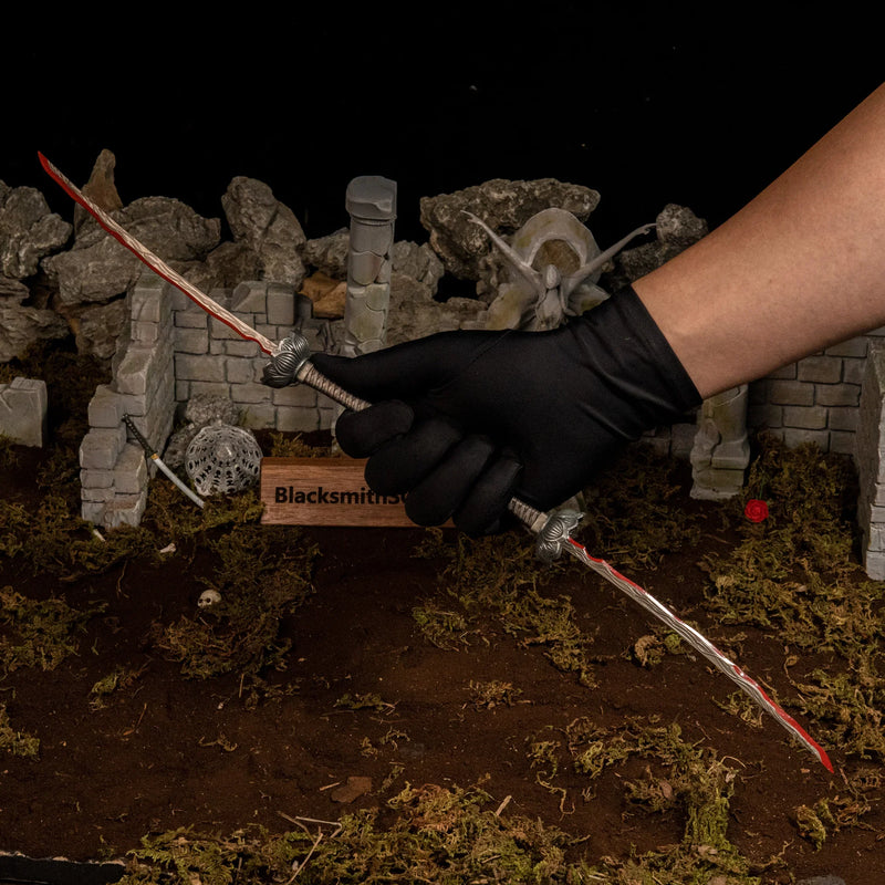 Hand clad in a black glove holding the 47.5cm Eleonora's Poleblade replica, showing its immense length compared to human scale.