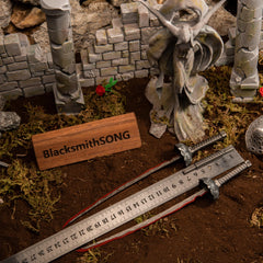 Eleonora's Poleblade metal replica measured against a ruler, confirming its massive 47.5cm length next to broken pillars.