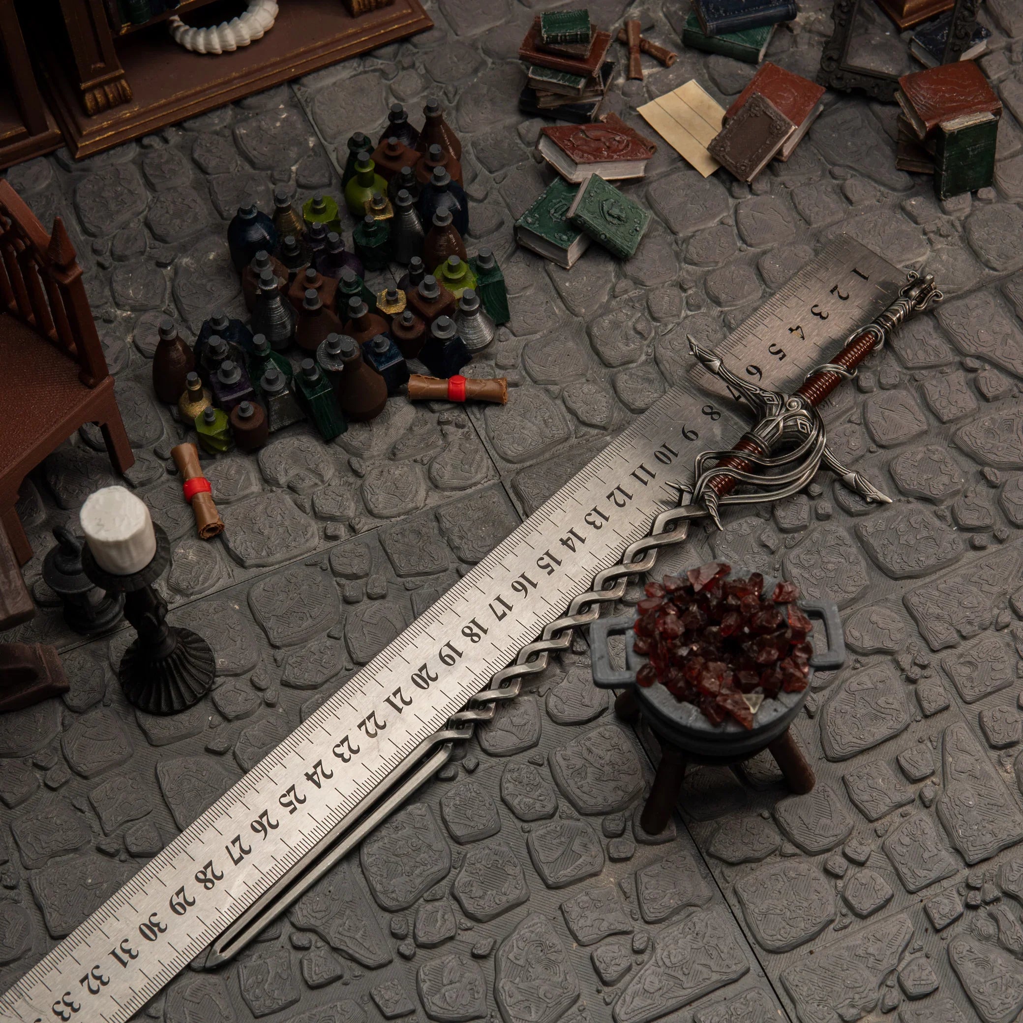 Fire Knight's Greatsword metal replica measured against a ruler on cobblestones, confirming its exact 30cm colossal length.