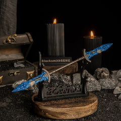 Gargoyle's Black Blades displayed horizontally on a large black sword stand over black sand.