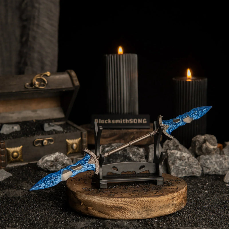 Gargoyle's Black Blades displayed on a small horizontal stand in a dark, rocky setting.