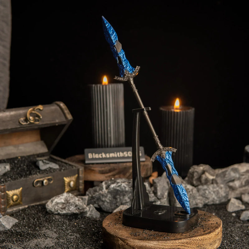 Vertical display of the Gargoyle's Black Blades on an upright black stand against a dark background with lit candles.
