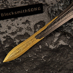Detailed view of the transition point on the Gargoyle's Greatsword replica where the bronze blade meets the golden, mended tip section.