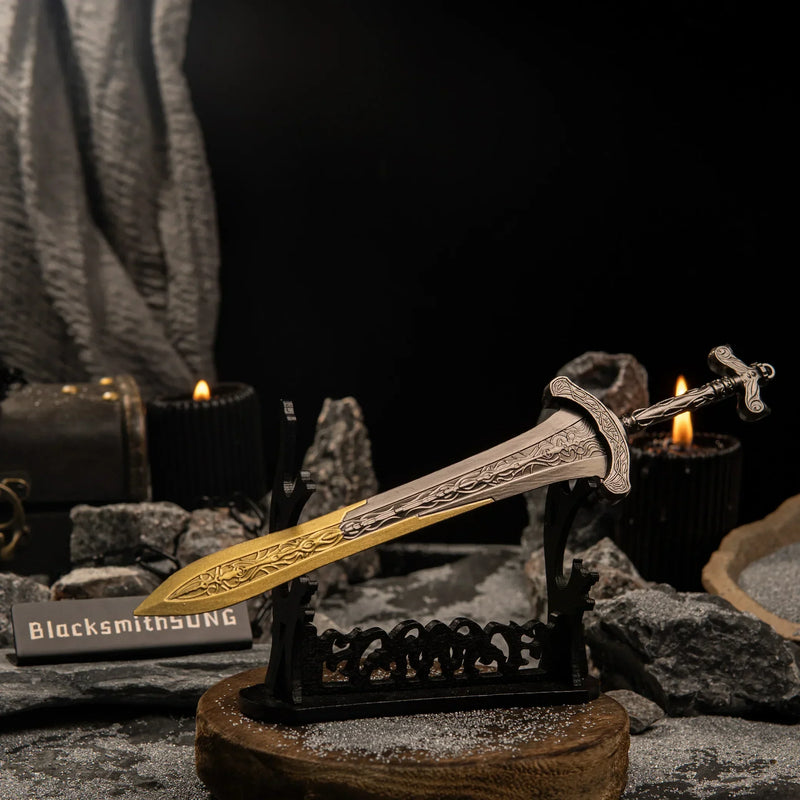 Gargoyle's Greatsword metal replica displayed horizontally on a large black decorative stand over a circular wooden base in a dark setting.
