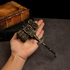 Giant-Crusher replica (17cm die-cast zinc alloy hammer) — held in hand for scale.