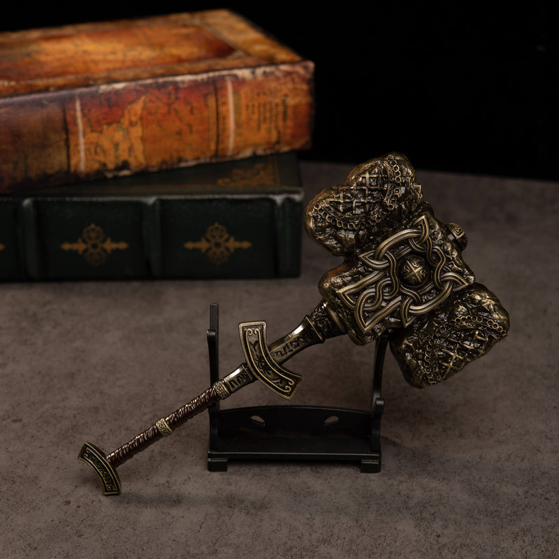 Giant-Crusher replica — held low and angled on the small display stand.