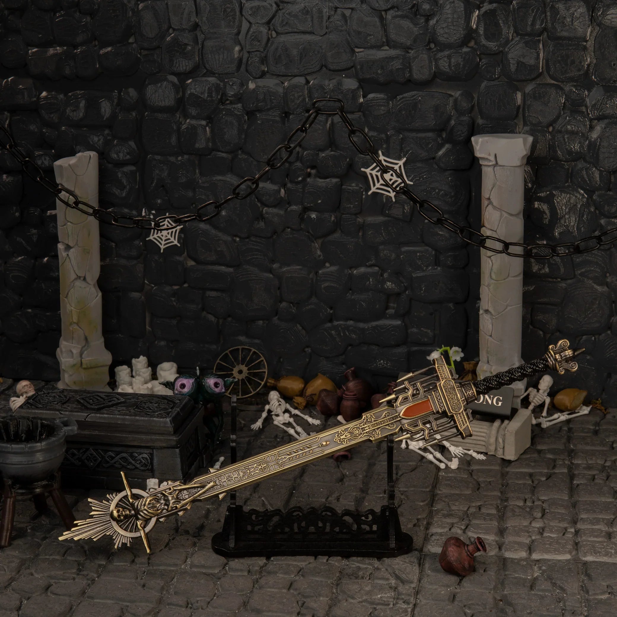 Golden Epitaph replica — displayed on the large stand between broken stone pillars.