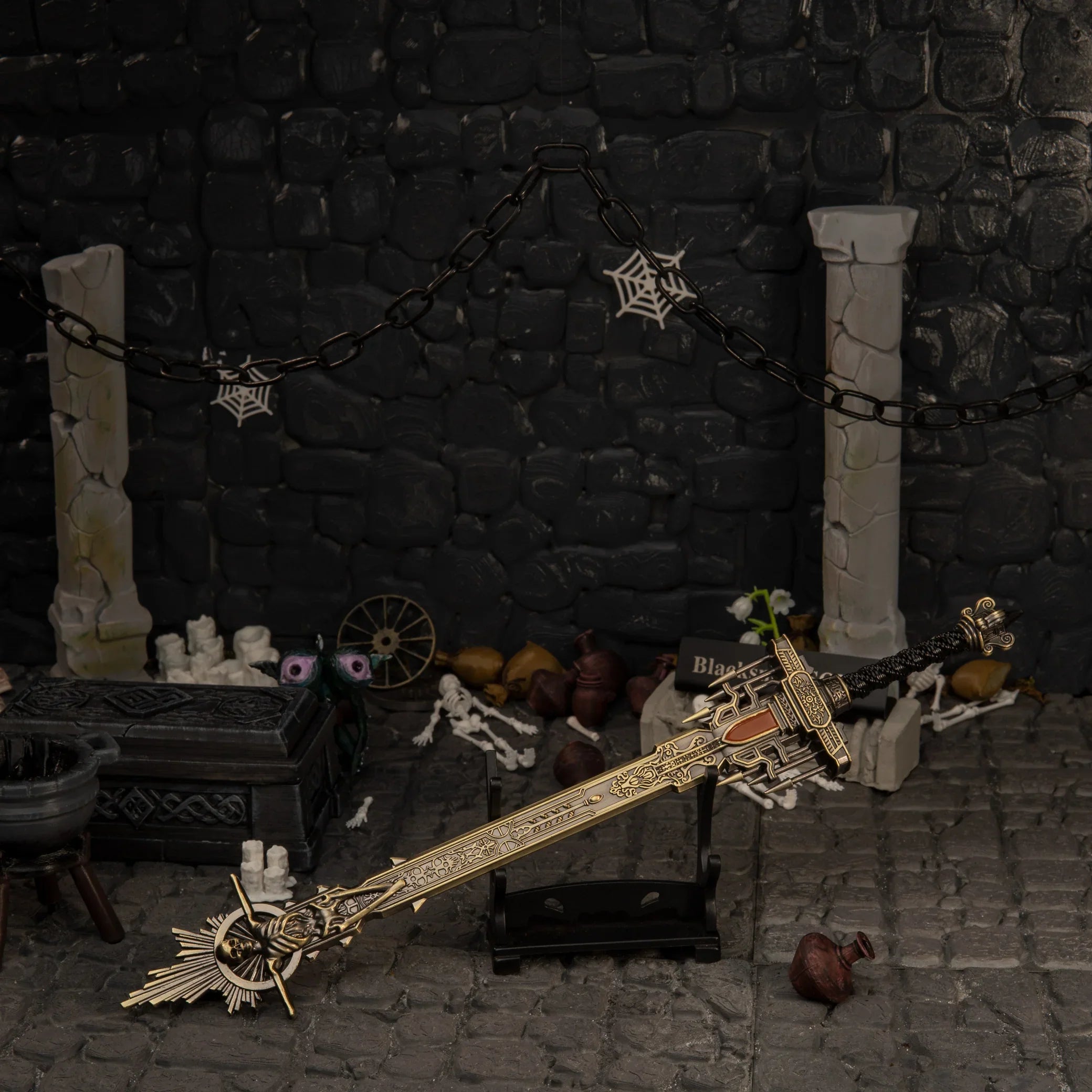 Golden Epitaph replica — displayed on the small stand inside the tomb diorama.