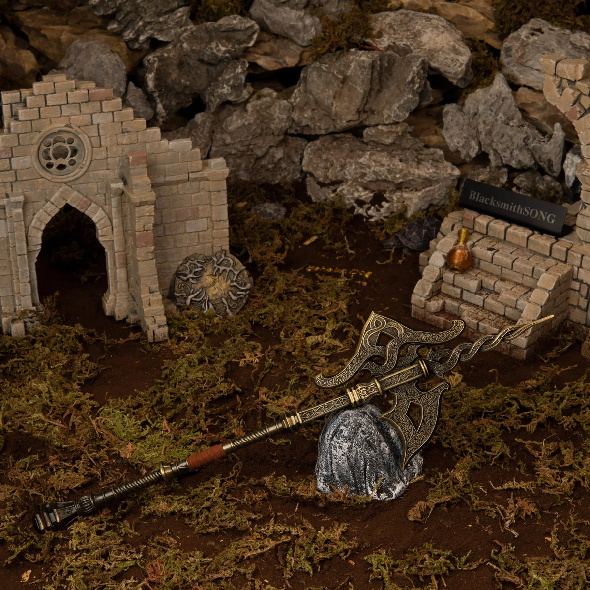 Golden Halberd replica (30cm die-cast zinc alloy halberd) — in a handcrafted Limgrave ruin diorama, by BlacksmithSONG.