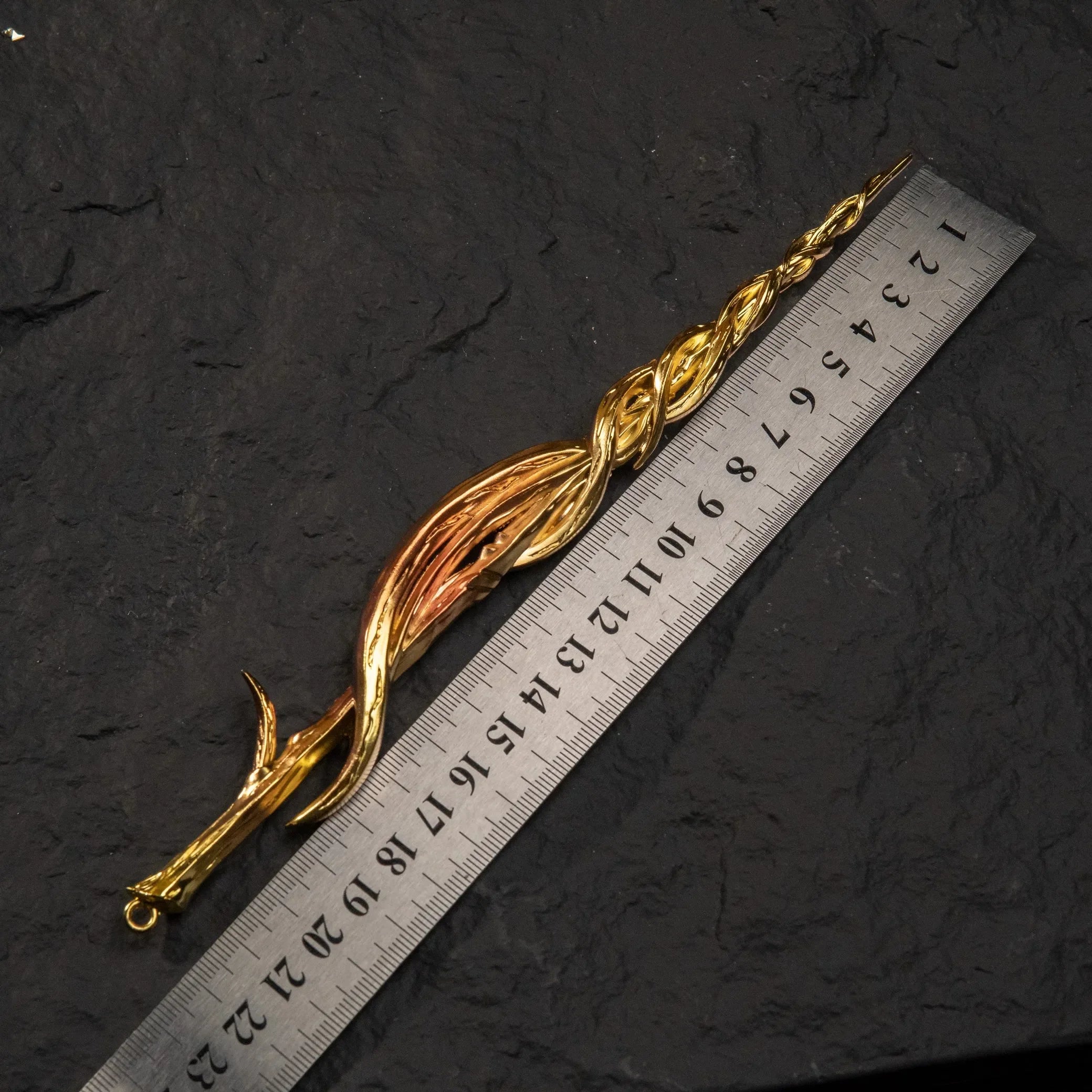 Greatsword of Damnation replica placed next to a ruler showing a length of approximately 22cm.