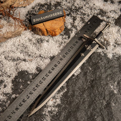 Greatsword of Solitude replica placed next to a ruler showing a length of approximately 30cm.