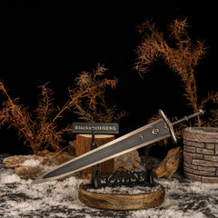 Greatsword of Solitude displayed horizontally on a large black sword stand with a wooden base in a snowy rock setting.