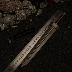 Greatsword metal replica placed next to a metal measuring ruler on black sand, confirming a massive total length of exactly 30 centimeters.