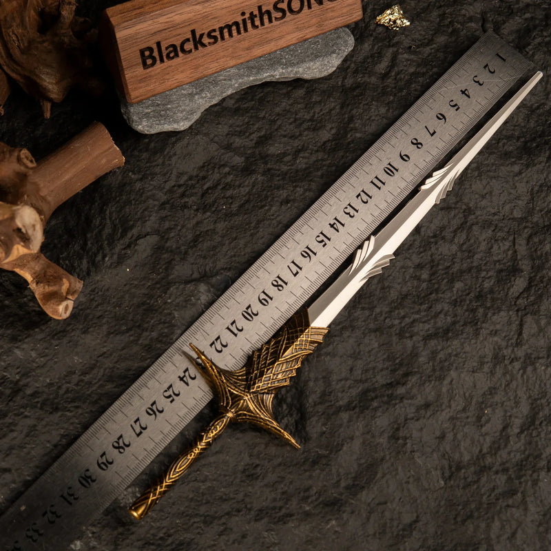 Leda's Sword metal replica placed next to a ruler showing a total length of approximately 30 centimeters.