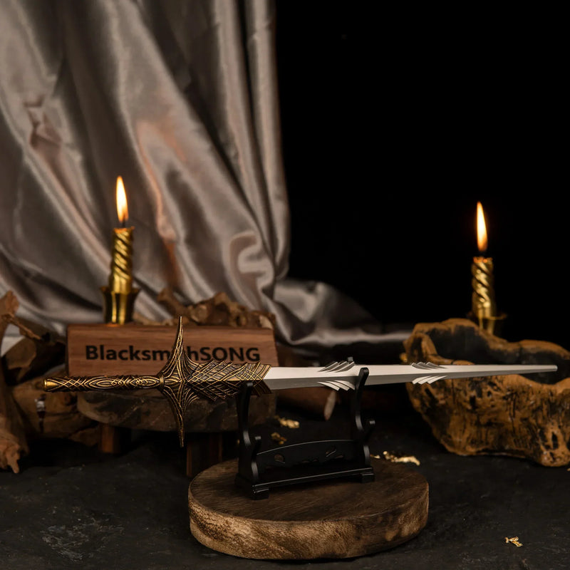 Angled view of Leda's Sword displayed on a compact stand with a BlacksmithSONG logo plate and dark aesthetic background.