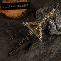 Macro close-up shot of the three-pronged trident head of the Mohgwyn's Sacred Spear replica, highlighting the detailed golden filigree and black finish.