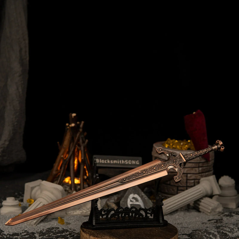 Ordovis's Greatsword metal replica displayed horizontally on a large black decorative stand over a circular wooden base in a ruins diorama.