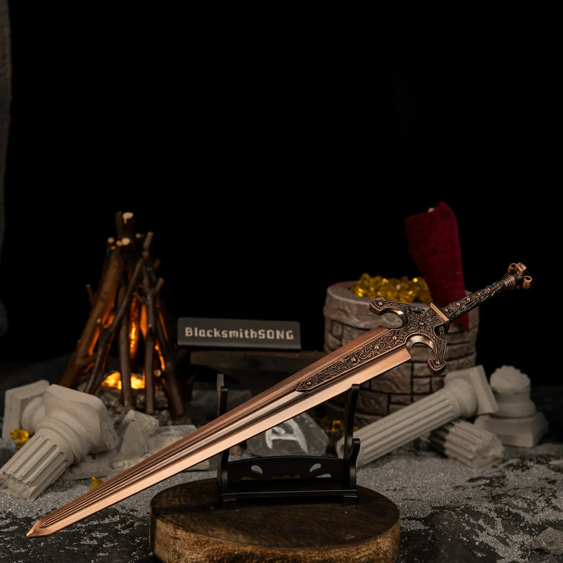 Ordovis's Greatsword miniature resting horizontally on a small black stand, positioned on a wooden base with a lit bonfire in the background.