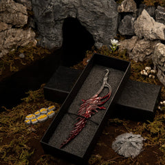 1/6 scale Reduvia Blood Blade metal miniature inside a black gift box, placed in a Murkwater River diorama.