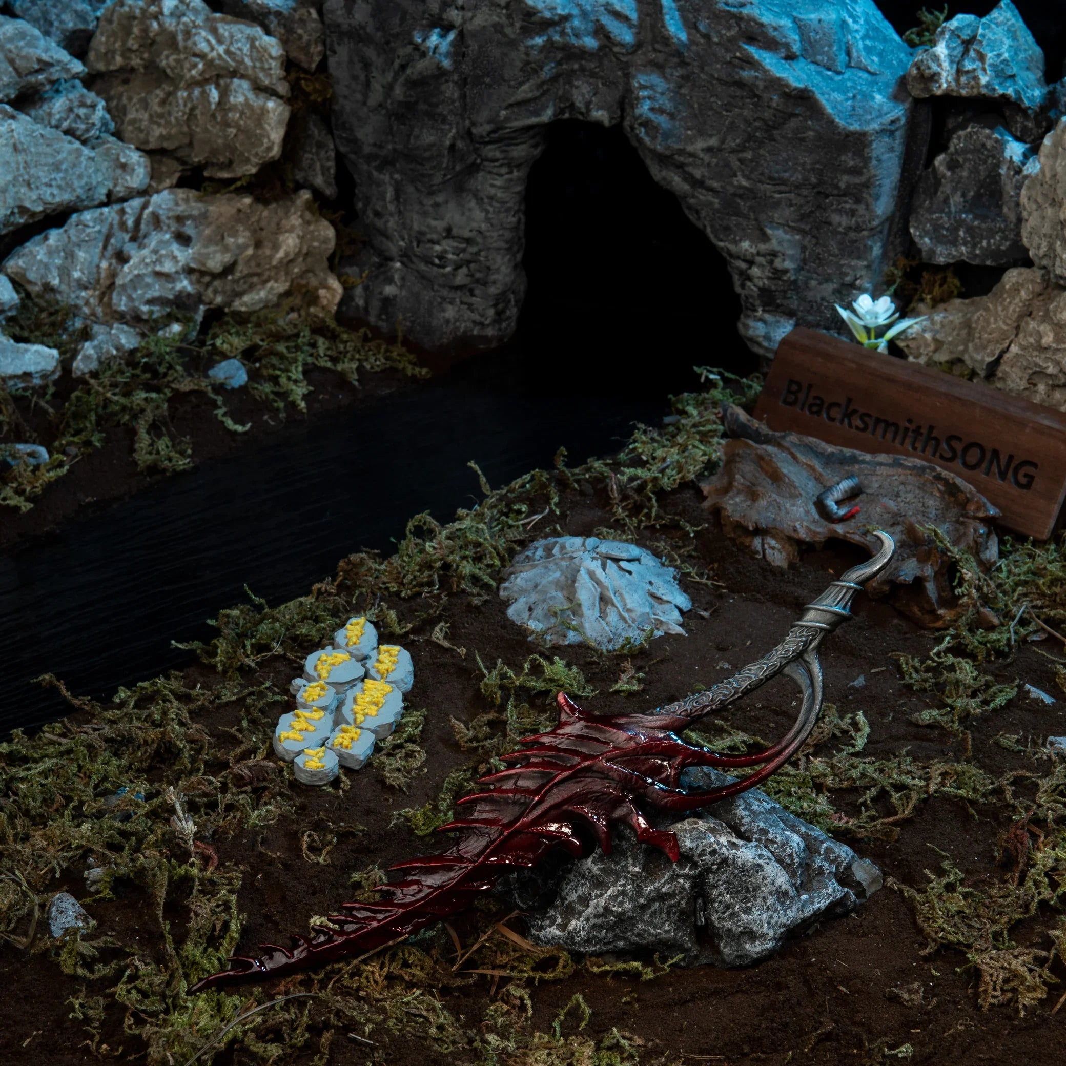 Reduvia replica displayed on a rock near a dark stream, with Murkwater Cave and a severed Bloody Finger in the background.