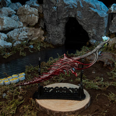 22cm Reduvia metal replica mounted on a large horizontal wooden stand (sold separately) near an unlit bonfire campfire.