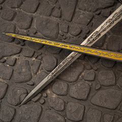 Rellana's Twin Blades replica — frost-etched hilt and pommel detail close-up.