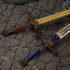 Rellana's Twin Blades replica — flame-etched hilt and crossguard detail close-up.