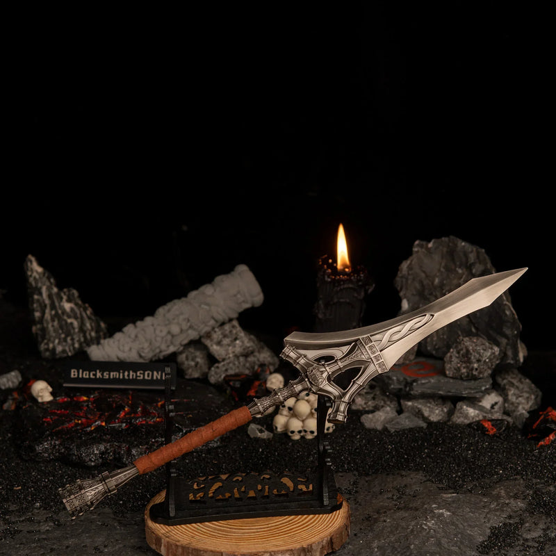 Serpent-Hunter metal replica displayed horizontally on a large black decorative stand over dark volcanic sand and skulls.